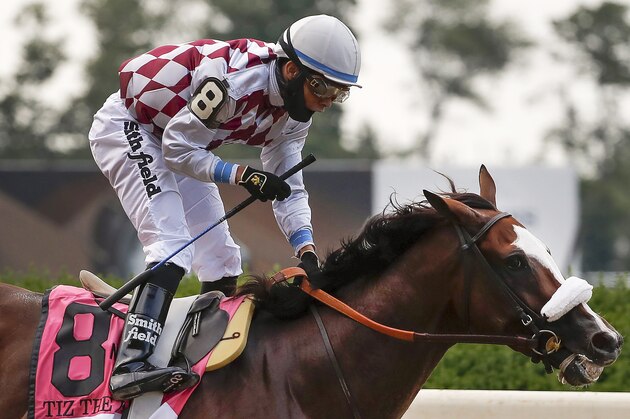 Jockey Manny Franco reacts after winning the 152nd running of the Belmont Stakes horse race atop Tiz the Law, Saturday, June 20, 2020, in Elmont, N.Y. (AP Photo/Seth Wenig)