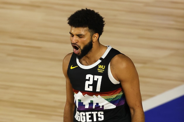Jamal Murray of the Denver Nuggets reacts after a shot during the second half of Game 5 of an NBA basketball first-round playoff series, Tuesday, Aug. 25, 2020, in Lake Buena Vista, Fla. (Mike Ehrmann/Pool Photo via AP)