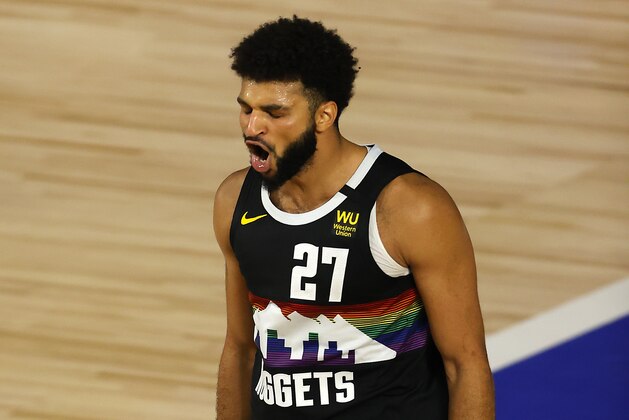 Jamal Murray of the Denver Nuggets reacts after a shot during the second half of Game 5 of an NBA basketball first-round playoff series, Tuesday, Aug. 25, 2020, in Lake Buena Vista, Fla. (Mike Ehrmann/Pool Photo via AP) Jamal Murray of the Denver Nuggets reacts after a shot during the second half of Game 5 of an NBA basketball first-round playoff series, Tuesday, Aug. 25, 2020, in Lake Buena Vista, Fla. (Mike Ehrmann/Pool Photo via AP)