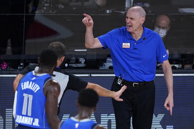 Dallas Mavericks head coach Rick Carlisle argues a call during the first half of an NBA basketball first round playoff game against the Los Angeles Clippers, Tuesday, Aug. 25, 2020, in Lake Buena Vista, Fla. (AP Photo/Ashley Landis, Pool)