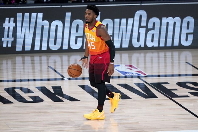 Utah Jazz's Donovan Mitchell (45) moves the ball up court against the Denver Nuggets during the first half of an NBA basketball first round playoff game Friday, Aug. 21, 2020, in Lake Buena Vista, Fla. (AP Photo/Ashley Landis, Pool) Utah Jazz's Donovan Mitchell (45) moves the ball up court against the Denver Nuggets during the first half of an NBA basketball first round playoff game Friday, Aug. 21, 2020, in Lake Buena Vista, Fla. (AP Photo/Ashley Landis, Pool)