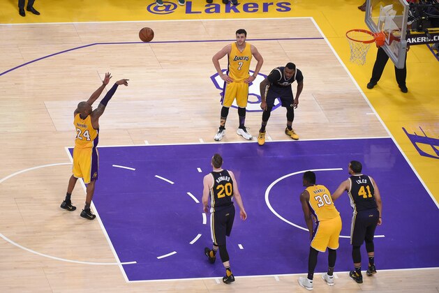 Los Angeles Lakers forward Kobe Bryant shoots a free throw for his last shot of the night during the Lakers' NBA basketball game against the Utah Jazz, Wednesday, April 13, 2016, in Los Angeles. Bryant scored 60 points in his final NBA game as the Lakers won 101-96. (AP Photo/Mark J. Terrill)
