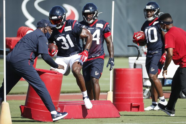 Houston Texans running back David Johnson (31) runs a drill during an NFL training camp football practice Tuesday, Aug. 25, 2020, in Houston. (Brett Coomer/Houston Chronicle via AP, Pool)