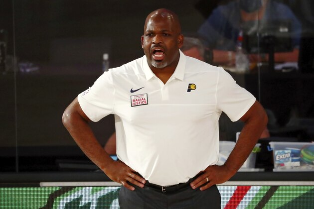 Indiana Pacers coach Nate McMillan gives instruction during the first half of the team's NBA basketball game against the Miami Heat on Monday, Aug. 10, 2020, in Lake Buena Vista, Fla. (Kim Klement/Pool Photo via AP)