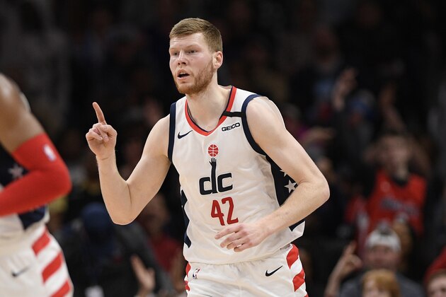 Washington Wizards forward Davis Bertans (42) gestures during the first half of an NBA basketball game against the Memphis Grizzlies, Sunday, Feb. 9, 2020, in Washington. (AP Photo/Nick Wass)