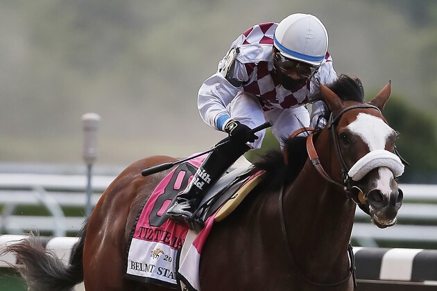 Tiz the Law (8), with jockey Manny Franco up, crosses the finish line to win the152nd running of the Belmont Stakes horse race, Saturday, June 20, 2020, in Elmont, N.Y. (AP Photo/Seth Wenig)