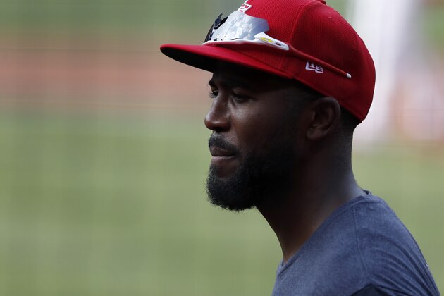 St. Louis Cardinals' Dexter Fowler prepares to take batting practice during a baseball workout at Busch Stadium Wednesday, July 8, 2020, in St. Louis. (AP Photo/Jeff Roberson)