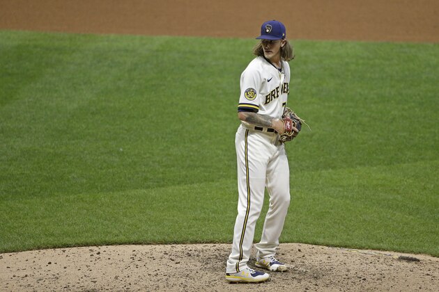 Milwaukee Brewers' Josh Hader pitches during the ninth inning of a baseball game against the Cincinnati Reds Monday, Aug. 24, 2020, in Milwaukee. (AP Photo/Aaron Gash)