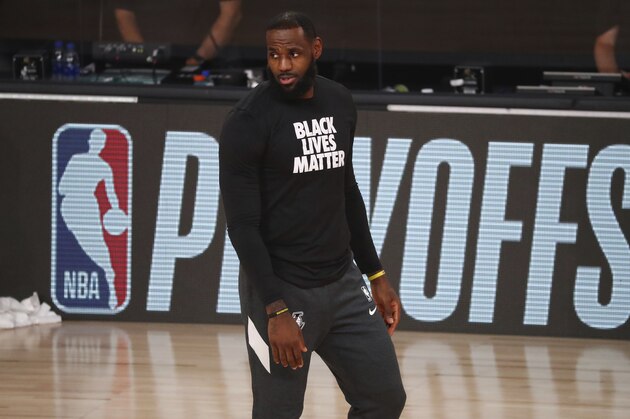 Los Angeles Lakers forward LeBron James looks on before Game 4 of an NBA basketball first-round playoff series against the Portland Trail Blazers, Monday, Aug. 24, 2020, in Lake Buena Vista, Fla. (Kim Klement/Pool Photo via AP)