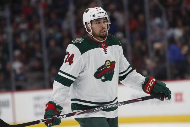 Minnesota Wild defenseman Matt Dumba (24) in the first period of an NHL hockey game Friday, Dec. 27, 2019, in Denver. (AP Photo/David Zalubowski)