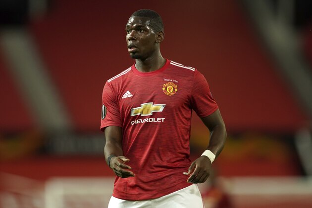 Manchester United's Paul Pogba during the Europa League round of 16 second leg soccer match between Manchester United and LASK at Old Trafford in Manchester, England, Wednesday, Aug. 5, 2020. (AP Photo/Dave Thompson)
