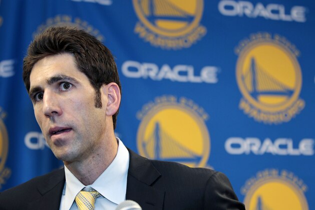 FILE - In this Tuesday, April 24, 2012, file photo, new Golden State Warriors general manager Bob Myers answers questions during a news conference in Oakland, Calif. Little about Myers fits the mold of most NBA general managers. All of 37 years old, the former sports agent and UCLA basketball walk-on has big plans _ and even bigger challenges _ ahead as he takes over basketball operations for his hometown Warriors. (AP Photo/Paul Sakuma, File) FILE - In this Tuesday, April 24, 2012, file photo, new Golden State Warriors general manager Bob Myers answers questions during a news conference in Oakland, Calif. Little about Myers fits the mold of most NBA general managers. All of 37 years old, the former sports agent and UCLA basketball walk-on has big plans _ and even bigger challenges _ ahead as he takes over basketball operations for his hometown Warriors. (AP Photo/Paul Sakuma, File)