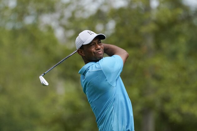 Tiger Woods hits from the 12th tee during the first round of the BMW Championship golf tournament, Thursday, Aug. 27, 2020, at Olympia Fields Country Club in Olympia Fields, Ill. (AP Photo/Charles Rex Arbogast) Tiger Woods hits from the 12th tee during the first round of the BMW Championship golf tournament, Thursday, Aug. 27, 2020, at Olympia Fields Country Club in Olympia Fields, Ill. (AP Photo/Charles Rex Arbogast)