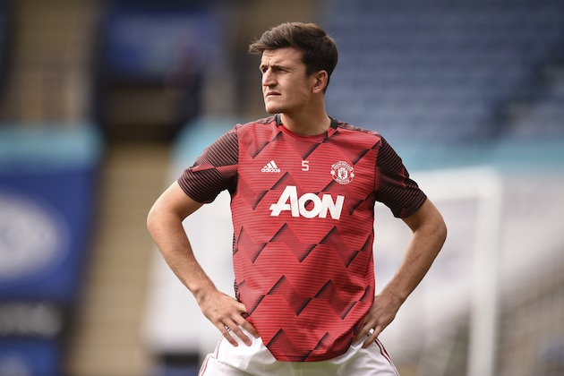 Manchester United's Harry Maguire looks on during warm up before the English Premier League soccer match between Leicester City and Manchester United at the King Power Stadium, in Leicester, England, Sunday, July 26, 2020. (Oli Scarff/Pool via AP)