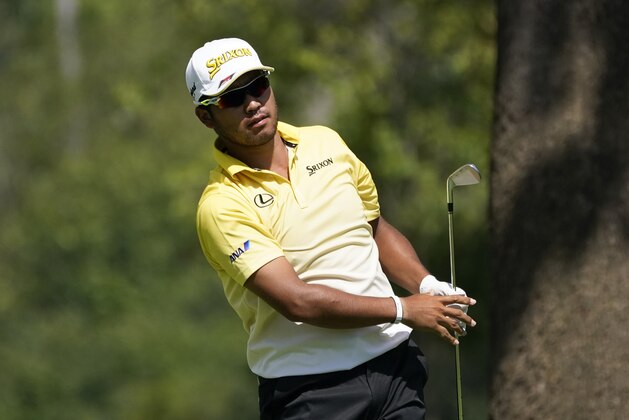 Hideki Matsuyama, of Japan, hits from the 12th tee during the first round of the BMW Championship golf tournament, Thursday, Aug. 27, 2020, at Olympia Fields Country Club in Olympia Fields, Ill. (AP Photo/Charles Rex Arbogast)