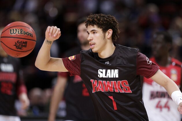 FILE - In this Nov. 17, 2019, file photo, LaMelo Ball of the Illawarra Hawks warms up before their game against the Sydney Kings in the Australian Basketball League in Sydney. LaMelo Ballâ€™s bid to be a club owner in Australia hasn't worked out. The American is expected to be a top pick in the upcoming NBA draft later this year.(AP Photo/Rick Rycroft, File)