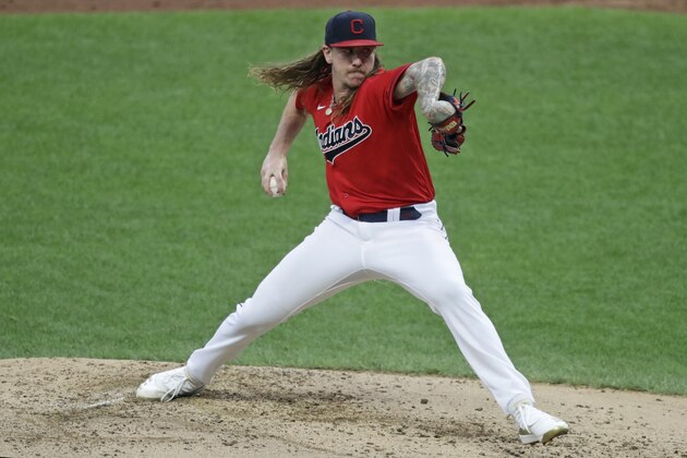 Cleveland Indians starting pitcher Mike Clevinger delivers in the second inning in a baseball game against the Minnesota Twins, Wednesday, Aug. 26, 2020, in Cleveland. (AP Photo/Tony Dejak)