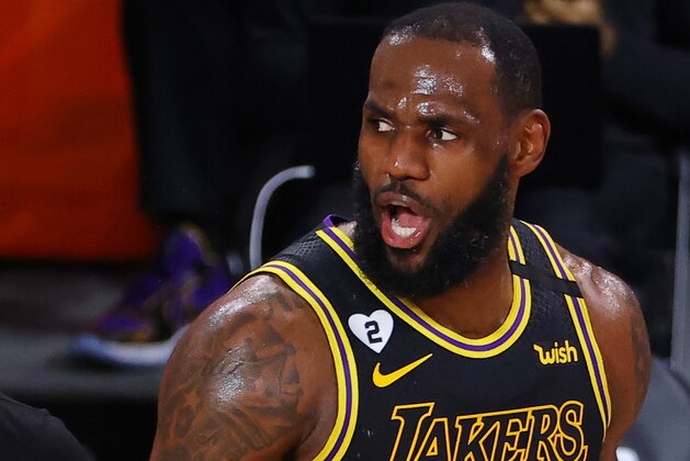 Los Angeles Lakers' LeBron James reacts against during the second quarter of Game 4 of an NBA basketball first-round playoff series against the Portland Trail Blazers, Monday, Aug. 24, 2020, in Lake Buena Vista, Fla. (Kevin C. Cox/Pool Photo via AP)