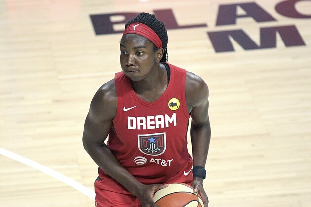 Atlanta Dream center Elizabeth Williams sets up for a shot during the second half of a WNBA basketball game against the Dallas Wings, Sunday, July 26, 2020, in Bradenton, Fla. (AP Photo/Phelan M. Ebenhack)