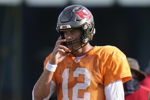 Tampa Bay Buccaneers quarterback Tom Brady (12) during an NFL football training camp practice Monday, Aug. 17, 2020, in Tampa, Fla. (AP Photo/Chris O'Meara) Tampa Bay Buccaneers quarterback Tom Brady (12) during an NFL football training camp practice Monday, Aug. 17, 2020, in Tampa, Fla. (AP Photo/Chris O'Meara)