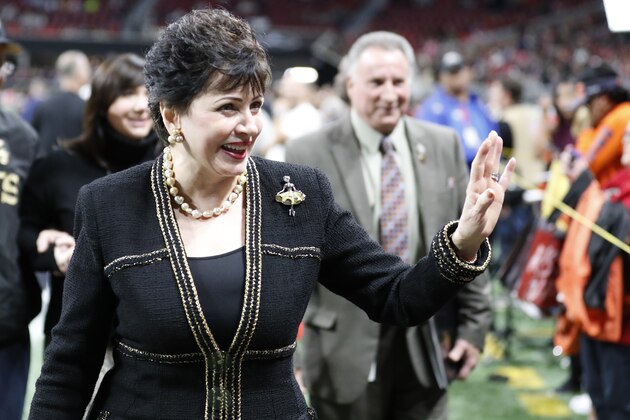 New Orleans Saints owner Gayle Benson waves to the crowd before the first half of an NFL football game between the Atlanta Falcons and the New Orleans Saints, Thursday, Nov. 28, 2019, in Atlanta. (AP Photo/John Bazemore)