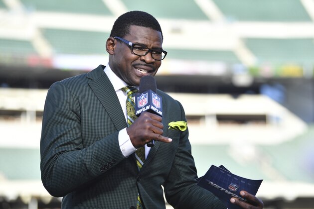 Michael Irvin performs during a program before an NFL football game between the Cincinnati Bengals and the Baltimore Ravens, Thursday, Sept. 13, 2018, in Cincinnati. (AP Photo/Bryan Woolston)