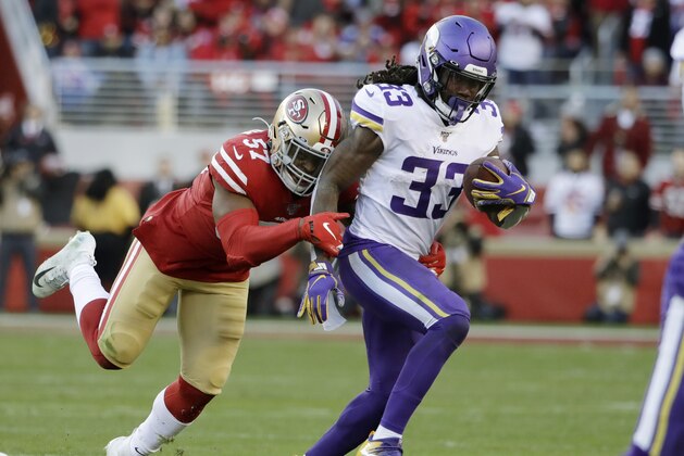Minnesota Vikings running back Dalvin Cook (33) runs against San Francisco 49ers linebacker Dre Greenlaw (57) during the second half of an NFL divisional playoff football game, Saturday, Jan. 11, 2020, in Santa Clara, Calif. (AP Photo/Marcio Jose Sanchez)