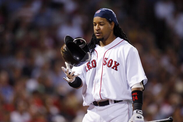 FILE- In this July 30, 2008 file photo, Boston Red Sox's Manny Ramirez walks back to the dugout after flying out in the fourth inning of a baseball game against the Los Angeles Angels at Fenway Park in Boston. Ramirez has notified Major League Baseball that he is retiring after being notified of an issue under MLB's drug policy. The commissioner's office issued a statement Friday, April 8, 2011, that said Ramirez decided to retire rather than go through MLB's Joint Drug Prevention and Treatment Program.(AP Photo/Elise Amendola, File) FILE- In this July 30, 2008 file photo, Boston Red Sox's Manny Ramirez walks back to the dugout after flying out in the fourth inning of a baseball game against the Los Angeles Angels at Fenway Park in Boston. Ramirez has notified Major League Baseball that he is retiring after being notified of an issue under MLB's drug policy. The commissioner's office issued a statement Friday, April 8, 2011, that said Ramirez decided to retire rather than go through MLB's Joint Drug Prevention and Treatment Program.(AP Photo/Elise Amendola, File)