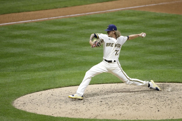 Milwaukee Brewers' Josh Hader pitches during the ninth inning of a baseball game against the Cincinnati Reds Tuesday, Aug. 25, 2020, in Milwaukee. (AP Photo/Aaron Gash)