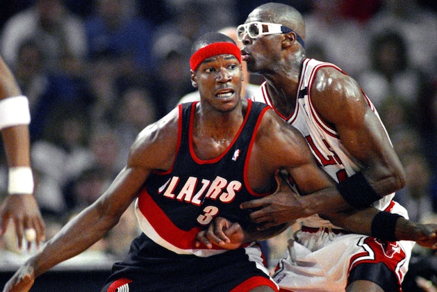 The Chicago Bulls' Horace Grant, right, gets tangled up with Portland Trail Blazers' Cliff Robinson as Grant tries to hold him back during first quarter of Game 1 of the NBA Finals in Chicago, Wednesday, June 3, 1992. The Bulls won 122-89. (AP Photo/John Swart) The Chicago Bulls' Horace Grant, right, gets tangled up with Portland Trail Blazers' Cliff Robinson as Grant tries to hold him back during first quarter of Game 1 of the NBA Finals in Chicago, Wednesday, June 3, 1992. The Bulls won 122-89. (AP Photo/John Swart)