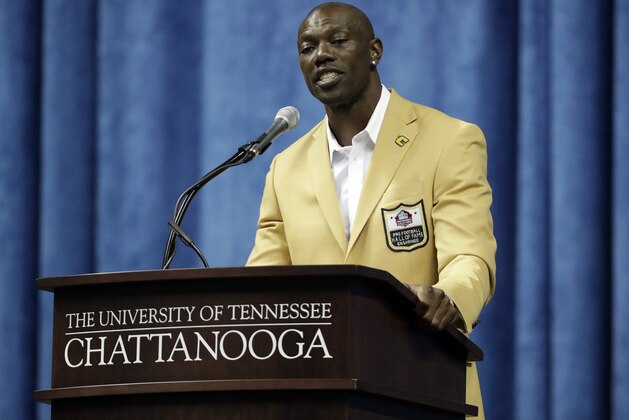 Former wide receiver Terrell Owens delivers his Pro Football Hall of Fame speech on Saturday, Aug. 4, 2018, in Chattanooga, Tenn. Instead of speaking at the Hall of Fame festivities in Canton, Ohio, Owens celebrated his induction at the University of Tennessee at Chattanooga, where he played football and basketball and ran track. (AP Photo/Mark Humphrey)