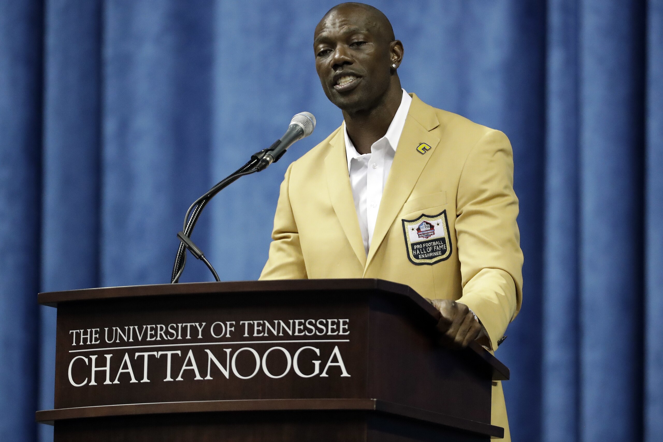 Former wide receiver Terrell Owens delivers his Pro Football Hall of Fame speech on Saturday, Aug. 4, 2018, in Chattanooga, Tenn. Instead of speaking at the Hall of Fame festivities in Canton, Ohio, Owens celebrated his induction at the University of Tennessee at Chattanooga, where he played football and basketball and ran track. (AP Photo/Mark Humphrey)