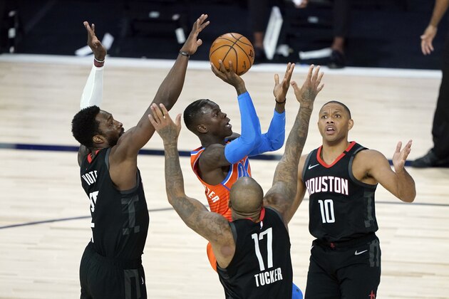 Oklahoma City Thunder's Dennis Schroder, center, shoots as Houston Rockets' Eric Gordon (10), P.J. Tucker (17) and Jeff Green defend during the first half of an NBA basketball first round playoff game Saturday, Aug. 29, 2020, in Lake Buena Vista, Fla. (AP Photo/Ashley Landis) Oklahoma City Thunder's Dennis Schroder, center, shoots as Houston Rockets' Eric Gordon (10), P.J. Tucker (17) and Jeff Green defend during the first half of an NBA basketball first round playoff game Saturday, Aug. 29, 2020, in Lake Buena Vista, Fla. (AP Photo/Ashley Landis)