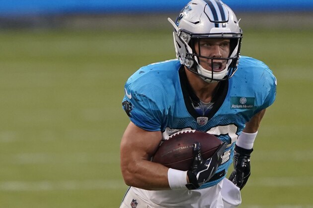 Carolina Panthers running back Christian McCaffrey runs a play during an NFL football camp practice Wednesday, Aug. 26, 2020, in Charlotte, N.C. (AP Photo/Chris Carlson)