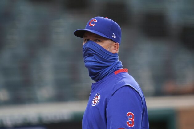 Chicago Cubs manager David Ross watches against the Detroit Tigers in the second inning of a baseball game in Detroit, Tuesday, Aug. 25, 2020. (AP Photo/Paul Sancya)