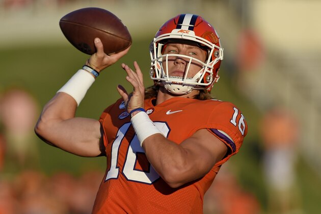 Clemson quarterback Trevor Lawrence warms up before the start of an NCAA college football game against Charlotte Saturday, Sept. 21, 2019, in Clemson, S.C. (AP Photo/Richard Shiro)