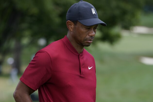 Tiger Woods walks during the final round of the BMW Championship golf tournament at the Olympia Fields Country Club in Olympia Fields, Ill., Sunday, Aug. 30, 2020. (AP Photo/Charles Rex Arbogast) Tiger Woods walks during the final round of the BMW Championship golf tournament at the Olympia Fields Country Club in Olympia Fields, Ill., Sunday, Aug. 30, 2020. (AP Photo/Charles Rex Arbogast)