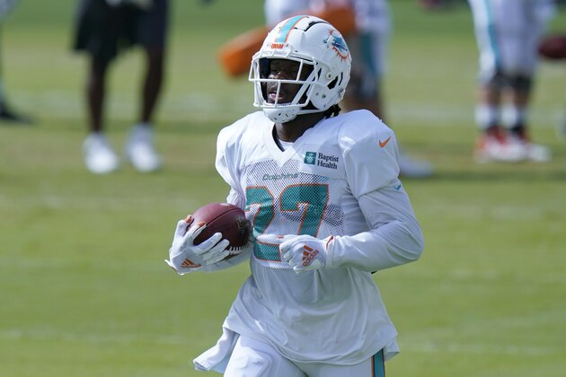 Miami Dolphins running back Kalen Ballage (27) does drills during practice at NFL football team's training facility, Friday, Aug. 21, 2020, in Davie, Fla. (AP Photo/Lynne Sladky)
