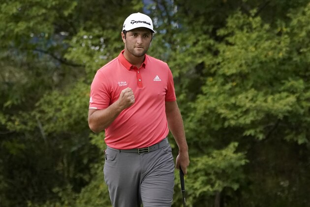 Jon Rahm reacts after making a birdie on the 16th hole during the final round of the BMW Championship golf tournament at the Olympia Fields Country Club in Olympia Fields, Ill., Sunday, Aug. 30, 2020. (AP Photo/Charles Rex Arbogast)
