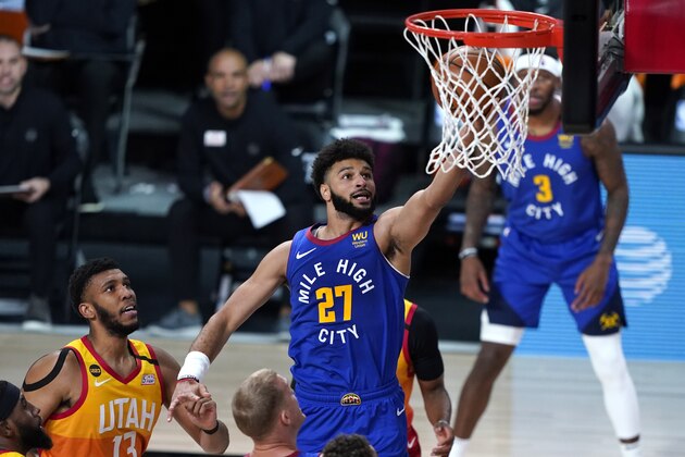 Denver Nuggets' Jamal Murray (27) goes up for a shot against the Utah Jazz during the first half of an NBA basketball first round playoff game Sunday, Aug. 30, 2020, in Lake Buena Vista, Fla. (AP Photo/Ashley Landis)