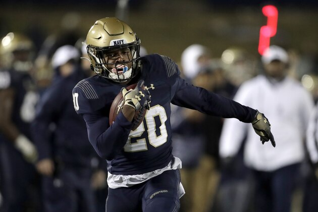 Navy wide receiver CJ Williams runs after making a catch against SMU during the second half of an NCAA college football game, Saturday, Nov. 23, 2019, in Annapolis, Md. (AP Photo/Julio Cortez) Navy wide receiver CJ Williams runs after making a catch against SMU during the second half of an NCAA college football game, Saturday, Nov. 23, 2019, in Annapolis, Md. (AP Photo/Julio Cortez)