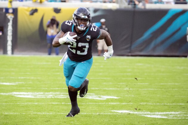 Jacksonville Jaguars running back Ryquell Armstead (23) runs the ball against the Indianapolis Colts during the first half of an NFL football game, Sunday, Dec. 29, 2019, in Jacksonville, Fla. (AP Photo/Stephen B. Morton)