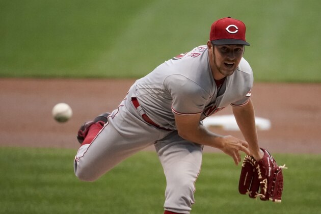 Cincinnati Reds starting pitcher Trevor Bauer throws during the first inning of a baseball game against the Milwaukee Brewers Friday, Aug. 7, 2020, in Milwaukee. (AP Photo/Morry Gash)