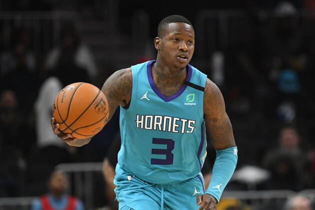 Charlotte Hornets guard Terry Rozier (3) brings the ball up the floor during an NBA basketball game against the Atlanta Hawks, Monday, March 9, 2020, in Atlanta. (AP Photo/John Amis)