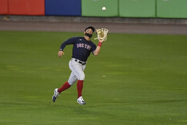 Boston Red Sox right fielder Kevin Pillar catches a pop-fly hit by Toronto Blue Jays' Brandon Drury during the fifth inning of a baseball game in Buffalo, N.Y., Tuesday, Aug. 25, 2020. (AP Photo/Adrian Kraus)