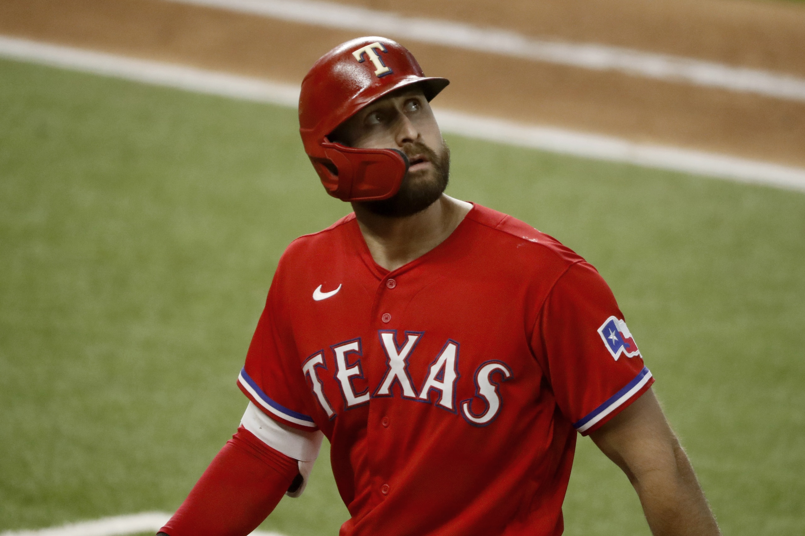 Texas Rangers outfielder Joey Gallo looks up at a replay after flying out in the fifth inning of a baseball game against the Los Angeles Dodgers in Arlington, Texas, Sunday, Aug. 30, 2020. (AP Photo/Roger Steinman) Texas Rangers outfielder Joey Gallo looks up at a replay after flying out in the fifth inning of a baseball game against the Los Angeles Dodgers in Arlington, Texas, Sunday, Aug. 30, 2020. (AP Photo/Roger Steinman)