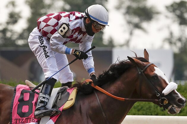 Jockey Manny Franco reacts after winning the 152nd running of the Belmont Stakes horse race atop Tiz the Law, Saturday, June 20, 2020, in Elmont, N.Y. (AP Photo/Seth Wenig) Jockey Manny Franco reacts after winning the 152nd running of the Belmont Stakes horse race atop Tiz the Law, Saturday, June 20, 2020, in Elmont, N.Y. (AP Photo/Seth Wenig)