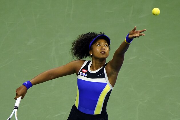 Naomi Osaka, of Japan, serves to Misaki Doi, of Japan, during the first round of the US Open tennis championships, Monday, Aug. 31, 2020, in New York. (AP Photo/Frank Franklin II)