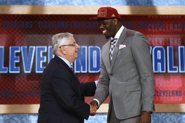 NBA Commissioner David Stern, left, shakes hands with UNLV's Anthony Bennett, who was selected first overall by the Cleveland Cavaliers in the NBA basketball draft, Thursday, June 27, 2013, in New York. (AP Photo/Jason DeCrow)