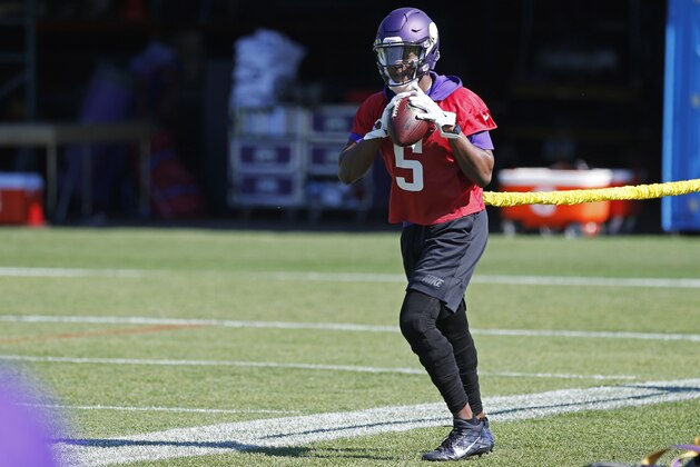 Minnesota Vikings quarterback Teddy Bridgewater goes through a resistance drill as he worked out during the NFL football teams practice Tuesday, June 6, 2017, in Eden Prairie, Minn. Bridgewater is recovering from a knee injury that kept him out last season. (AP Photo/Jim Mone)